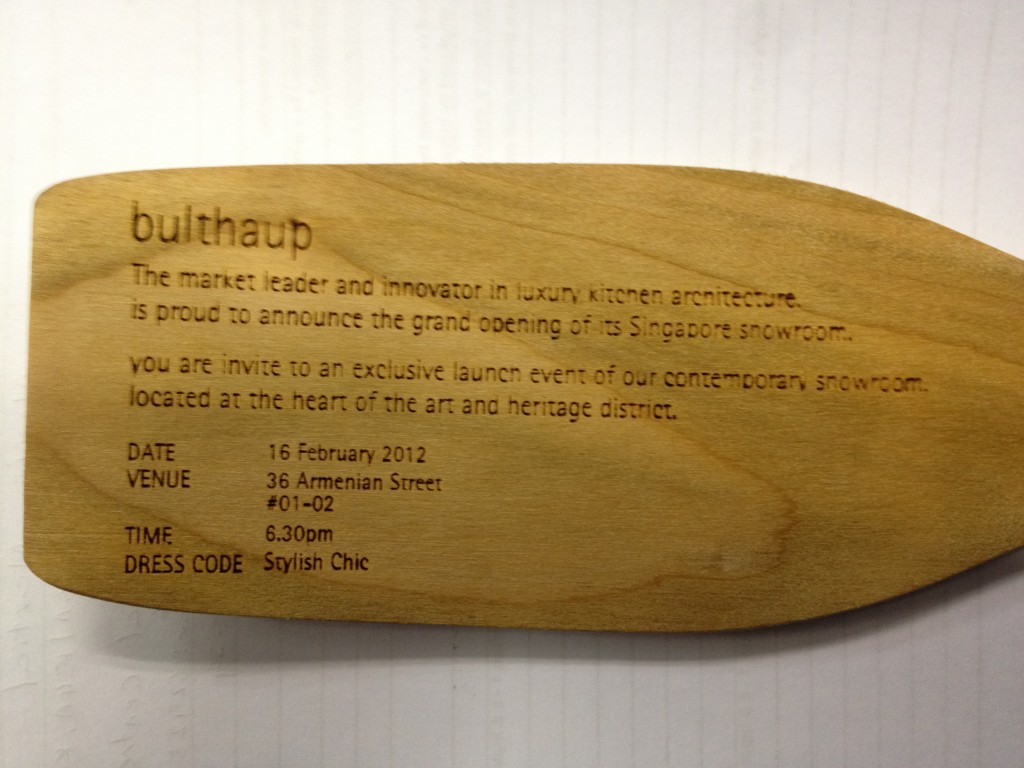 Wooden spatula as in invitation
